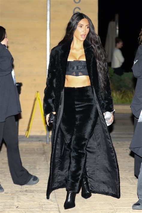 Kim Kardashian rocks fur maxi skirt and K coat for dinner with 